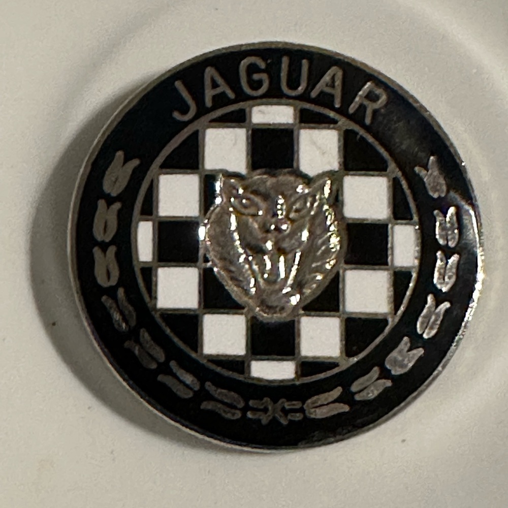 Vintage Jaguar Black and Silver Emblem